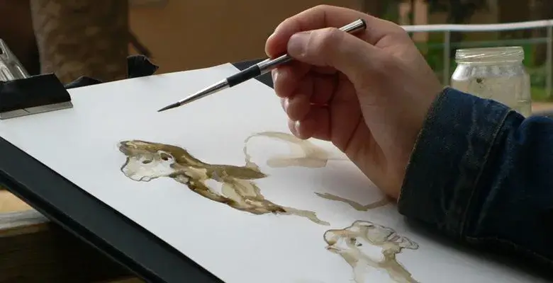 Artist painting some animals